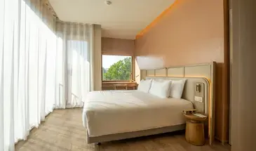 Premium Deluxe Suite Bedroom at Centara Ubon
