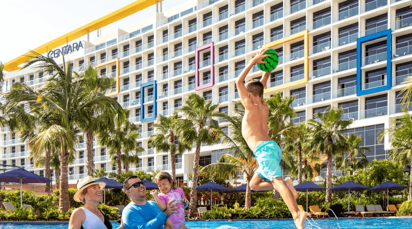A family enjoying the pool at Centara Mirage Beach Resort Dubai 